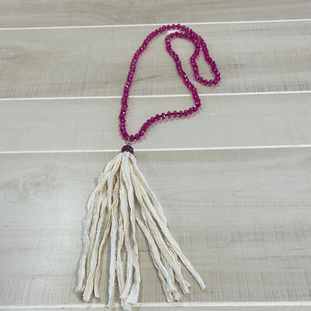 Elegant Pink Beaded Necklace with Cream Tassel